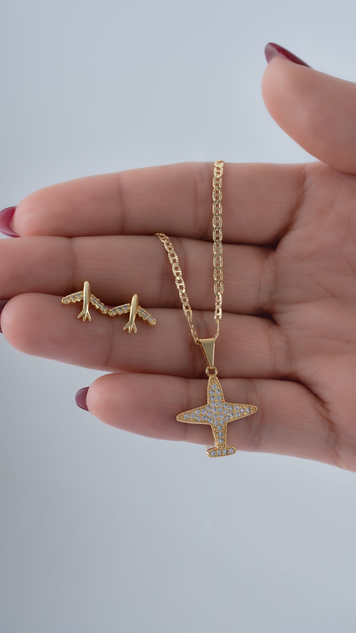 Conjunto airplane (cadena escalerita con destellos it 1.7mm 45cms + arete avión + dije)