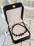 Pulsera trebol negro exclusive. N° de Balín: #4 diamant.