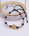 Pulsera San Benito G. N° de Balín: #6 argollado, #5 rosa, #5, liso, #5 acero.