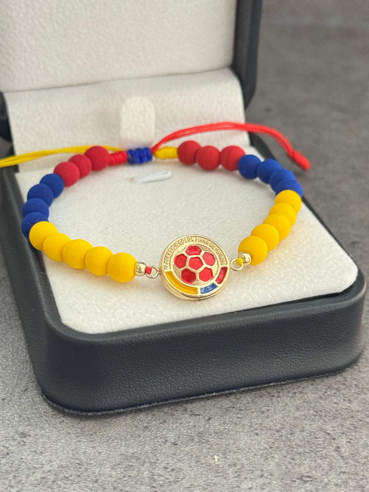 Pulsera Colombia. N de balín: #3 liso, neopreno liso.