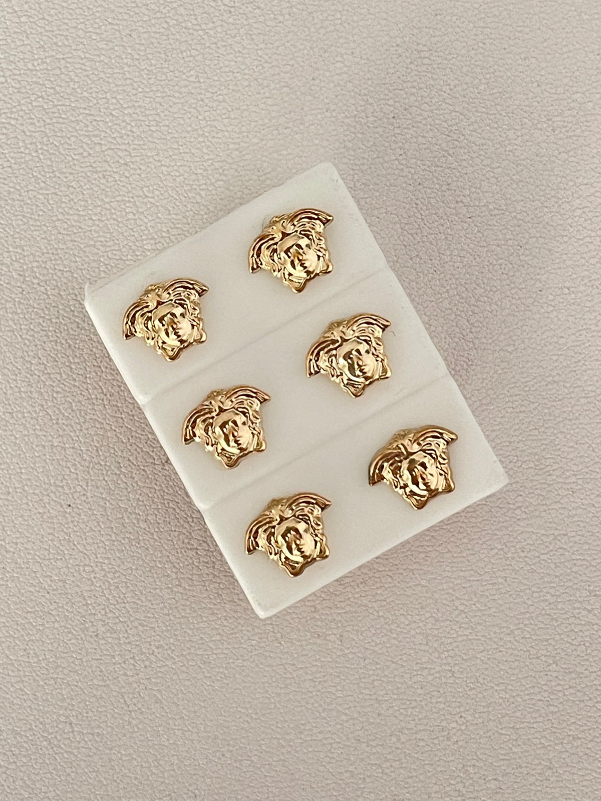 Topos versace broche de seguridad
