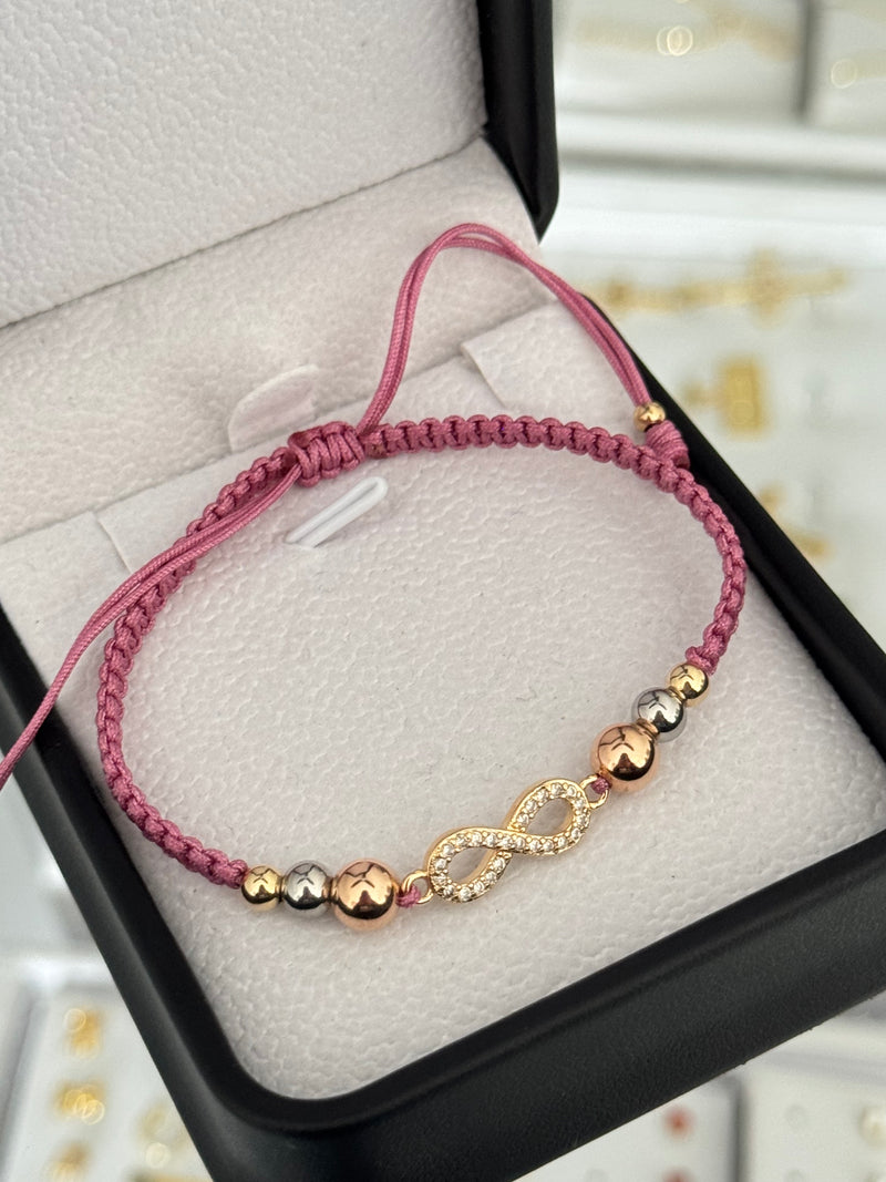 Pulsera infinito circonias. N° de Balín: #6 rosa, #5 acero, #4.
