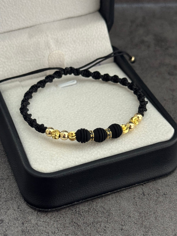 Pulsera espiral. N de balín: balin liso #4 [4 uni] , italiano #4 [4 uni], neopreno rayado #6 [3 uni] y 2 rondel negro
