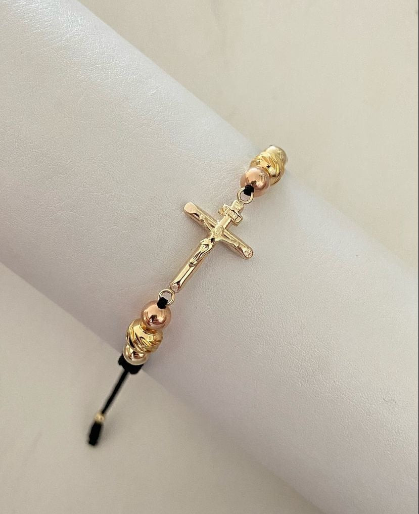 Pulsera Cruz con balines #4 y #5 lisos y diamantados en tonos rosa y dorados