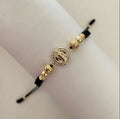 Pulsera San Benito con balines 4,5,6 diamantado.
