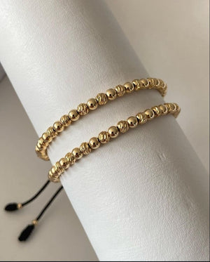 Juego pulsera con balines lisos y diamantados #4. X2
